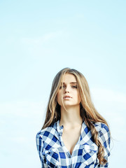 Pretty girl in blue sky