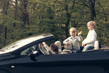 happy children friends in car