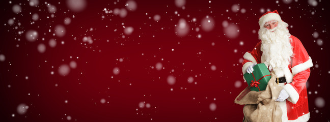 Weihnachtsmann mit Geschenken und Jutesack Banner