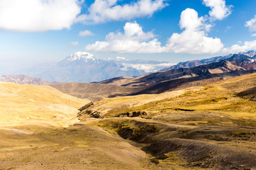 Illimani mountain peak covered snow valley landscape road Bolivia. 