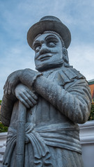Stone Thai-Chinese style sculpture and thai art architecture in Wat Phra Chetupon Vimolmangklararm (Wat Pho) temple, Thailand. Photo taken on: 2 November , 2016