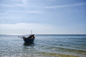 Fototapeta premium Boat Floating on The Sea