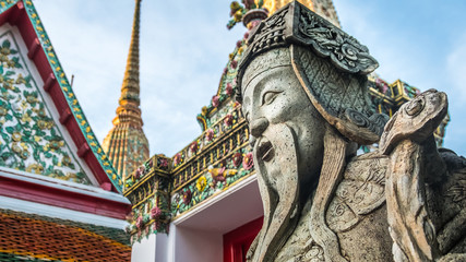 Stone Thai-Chinese style sculpture and thai art architecture in Wat Phra Chetupon Vimolmangklararm (Wat Pho) temple, Thailand. Photo taken on: 2 November , 2016
