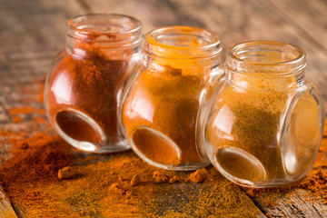 Spice. Various Spices over Wooden Background. paprika, turmeric, curry