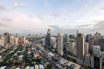 Fototapeta na wymiar Makati Skyline at night. Makati is a city in the Philippines` Metro Manila region and the country`s financial hub. 