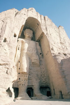 Defaced statue of the Buddha, 55m tall, carved in cliff by monks, since destroyed by the Taliban, Bamiyan, Afghanistan