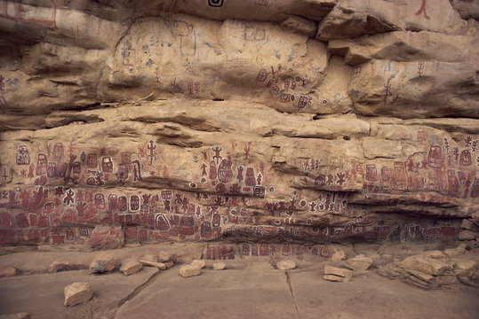 Decorated cliff wall at Dogon ritual site, Songo Village, Bandiagara Escarpment, Dogon Area, Mali