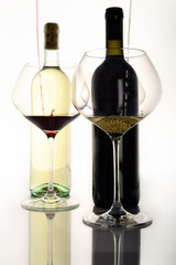 Bottle red and withe wine and glass 