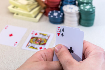 man holding play card