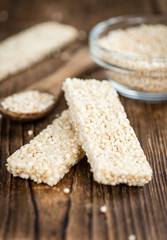Quinoa Bars on a wooden table (selective focus)