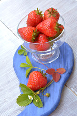 Ripe and fresh strawberry in transparent dish