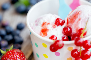 Icecream with berries. Selective focus