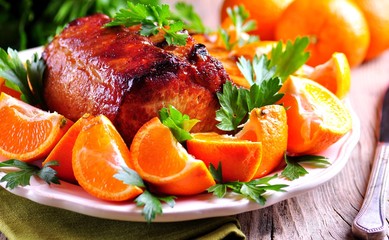 Delicious Roast Pork chop in orange sauce with chili and garlic.