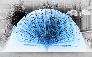 Blue fountain in Oslo on black and white background