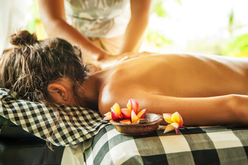 Woman at spa treatment massage 