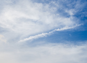 Blue sky and clouds in daylight, used as background 