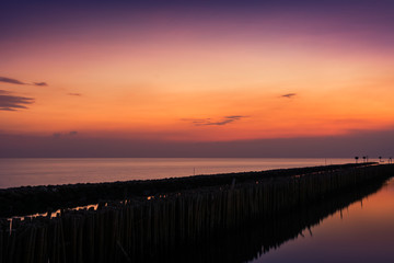 Fototapeta na wymiar Sunset by the sea coastal Bangkok, Thailand