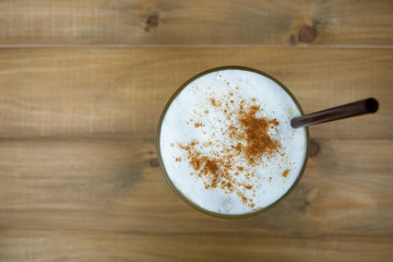 Top view Ice coffee on a wooden table