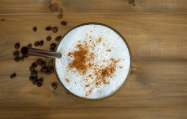 Top view Ice coffee on a wooden table