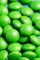Green Tablets Or Drugs In The Form Of Round Shape. Closeup. Macro.