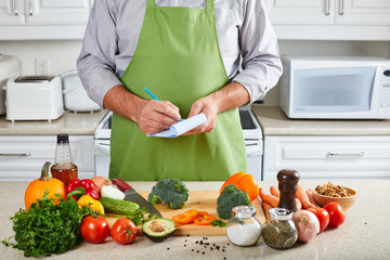 Chef man cooking in the kitchen.