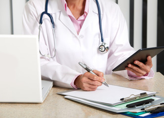 Doctor woman working in clinic.