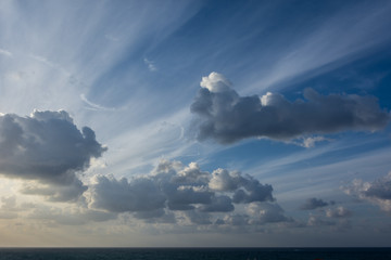 dramatic pre-sunset sky, clouds and sunbeams