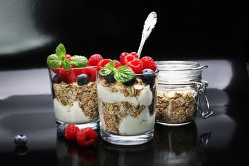 Cereals and flakes with nuts and fresh berries.