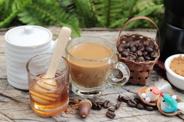 Coffee with milk and honey is delicious.
