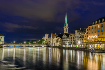 Naklejka na ściany i meble Night view of historic Zurich city center on summer, Canton of Zurich, Switzerland.