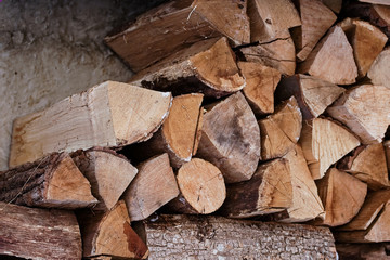 Pile of chopped fire wood logs.