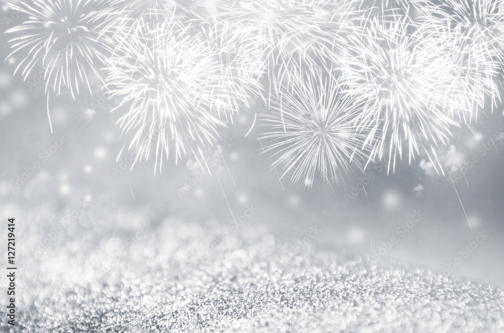 Wall mural defocused silver and gray fireworks and bokeh on gliter paper at new year and copy space. abstract b