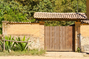 An Old Gate and Agava Plants in Mexico.