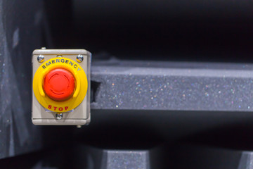 The red emergency button or stop button for Hand press. STOP Button for industrial machine, Emergeny Stop for Safety.