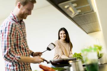 Couple in kitchen