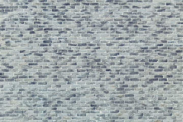 Gray brick wall.