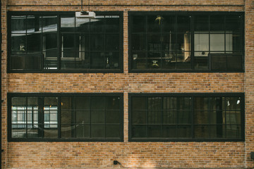 vintage industrial factory loft style design architecture large windows for background.