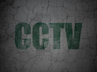 Privacy concept: CCTV on grunge wall background