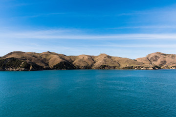 Obraz premium View of South Island, New Zealand from the ferry leaving Wellington