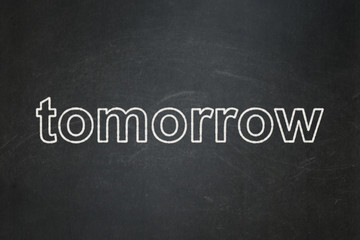 Obraz premium Time concept: Tomorrow on chalkboard background