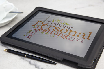 tablet with personal coaching word cloud