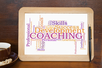 blackboard with coaching word cloud