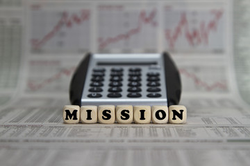 Mission word built with letter cubes