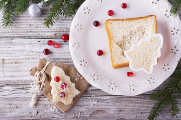 Fun food for kids and adults to toast  the festive lunch on Christmas  New Year of white  bread in the shape   trees. View from above.