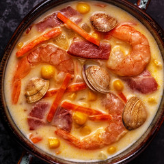 Homemade clam chowder with shrimps.