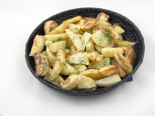 Potato wedges in the pan