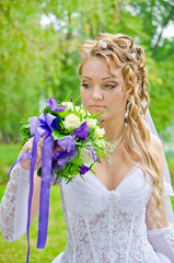Fototapeta premium Wedding bouquet in hand charming bride.