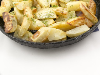 Potato wedges in the pan