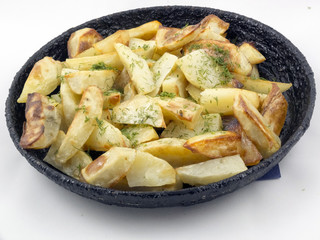 Potato wedges in the pan