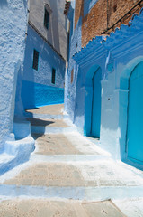 Naklejka premium Chefchaouen is a city in the Rif Mountains of northwest Morocco. It’s known for the striking, variously hued blue-washed buildings of its old town. 